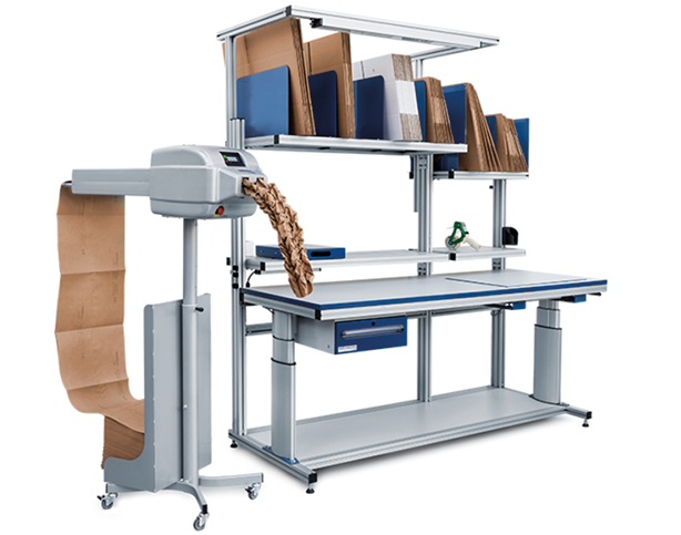 Machine de production de papier de calage associée à un poste de préparation ergonomique