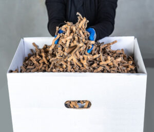 bac de copeaux de carton produit avec le matelasseur